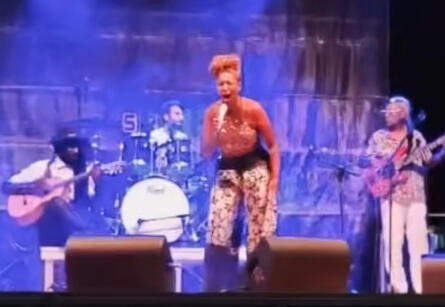 Adora Aiza singing soul music with live band at international festiva Adora Aiza Festival Soul Performance